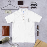 classic-polo-shirt-white-front-614f082190482.jpg